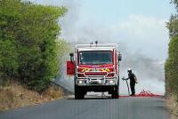 La quatre-voies enfumée par un feu de broussailles La quatre-voies enfumée par un feu de broussailles